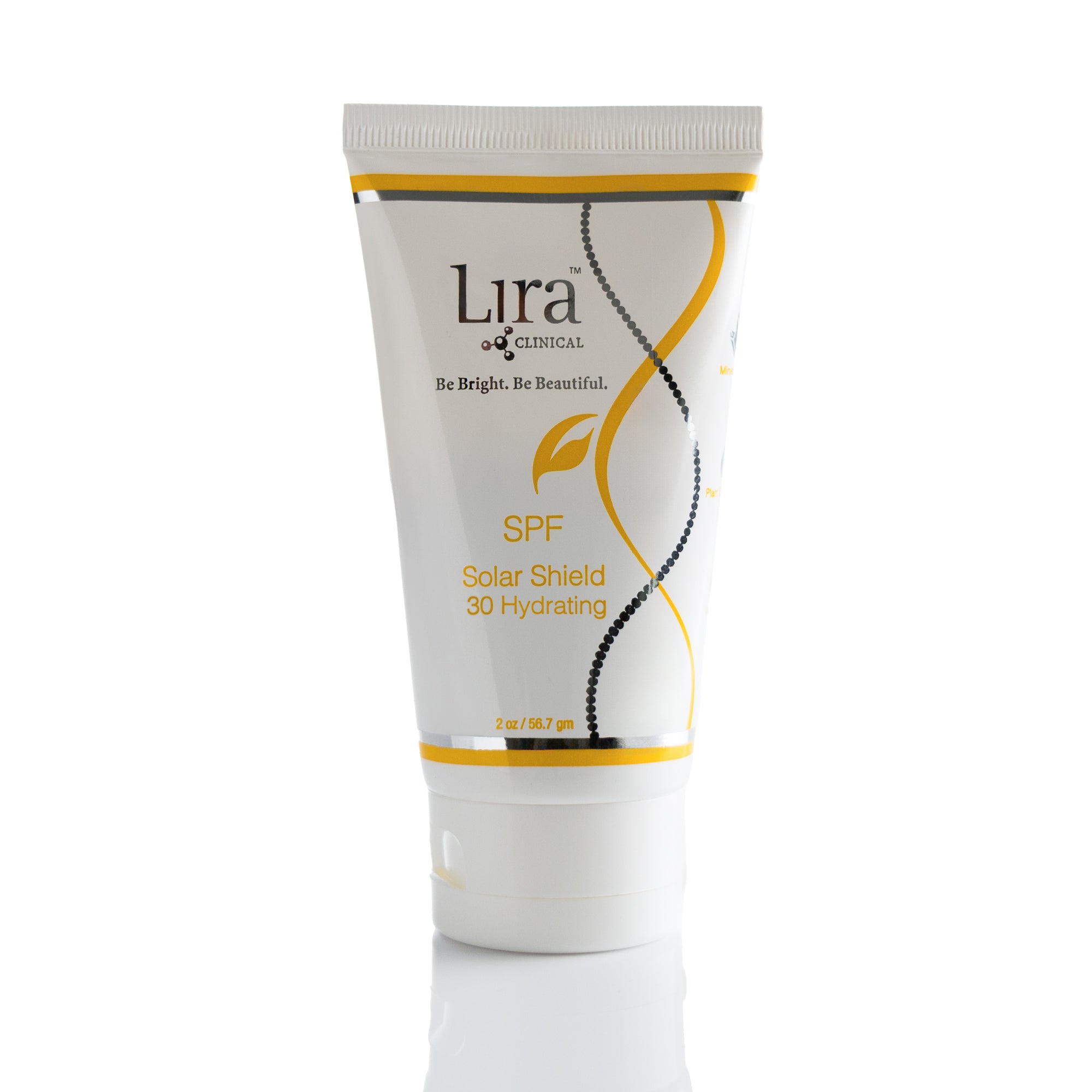2 oz tube with white lid yellow writing yellow and silver DNA SPF Solar Shield 30 Oil Free
