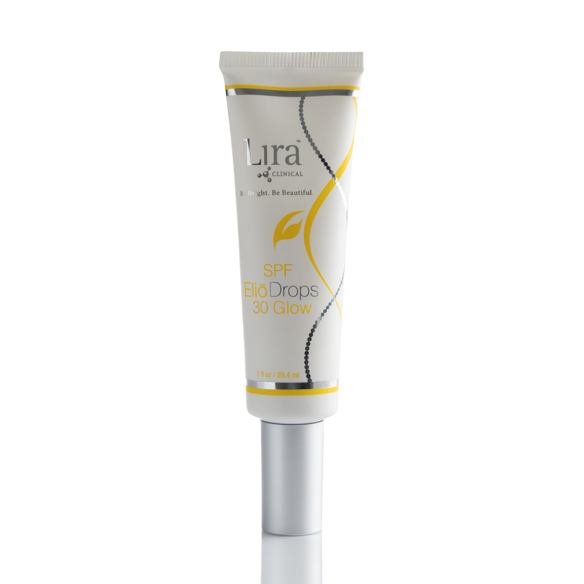 1 fl oz Tube with matte silver lid and yellow and silver DNA and writing SF ElioDrops 30 Glow