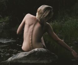 naked woman showing her back